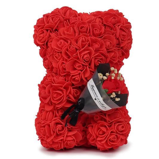 Artificial rose bear holding a bouquet